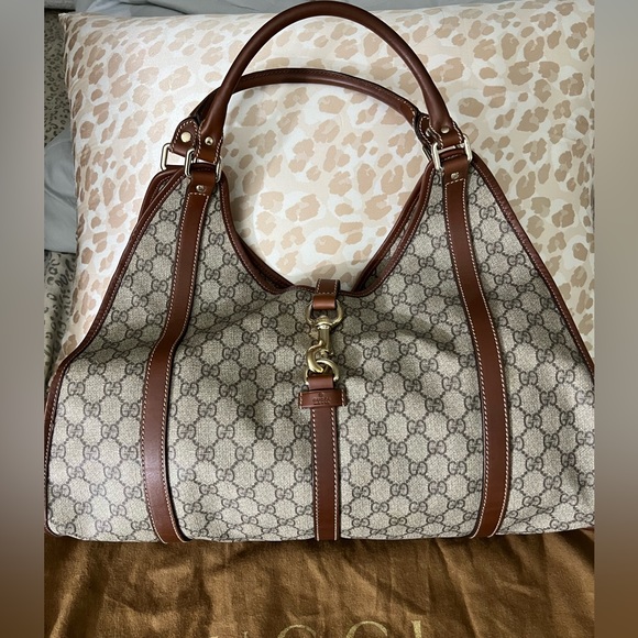 Gucci Handbags - Authentic Gucci hobo. Chocolate brown supreme canvas. 17x17 from handle